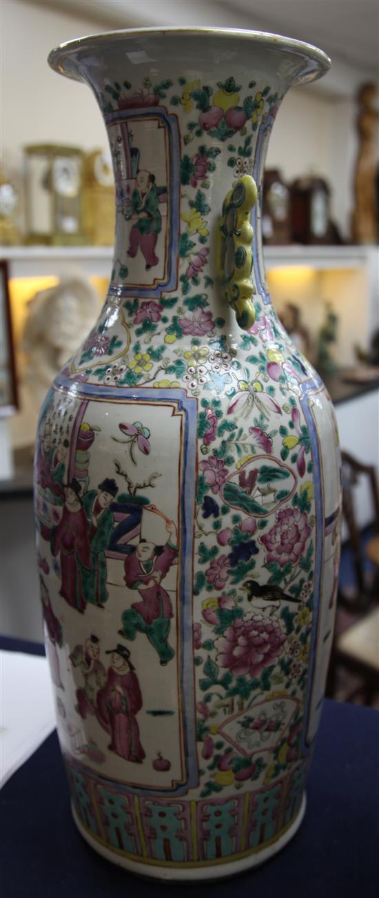A pair of large Chinese Canton-decorated famille rose two handled baluster vases, late 19th century, height 60.5cm